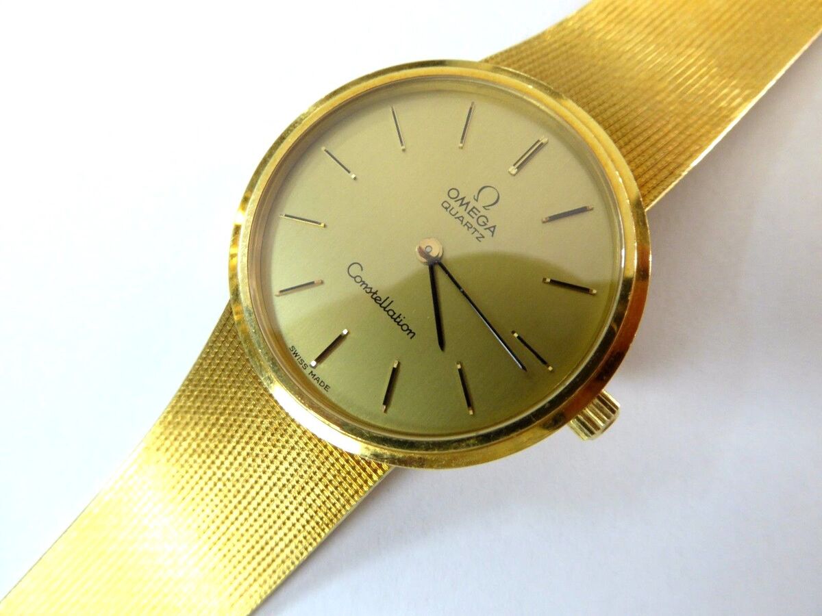 Shop Now: Vintage Omega Constellation 18k Gold Watch Deals.